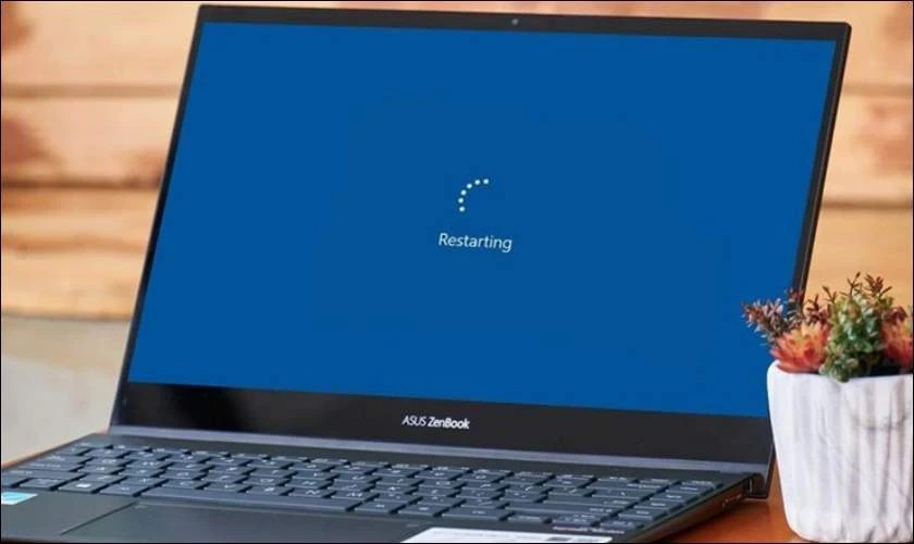 Khởi động lại máy để loại trừ lỗi tạm thời trên cảm ứng laptop